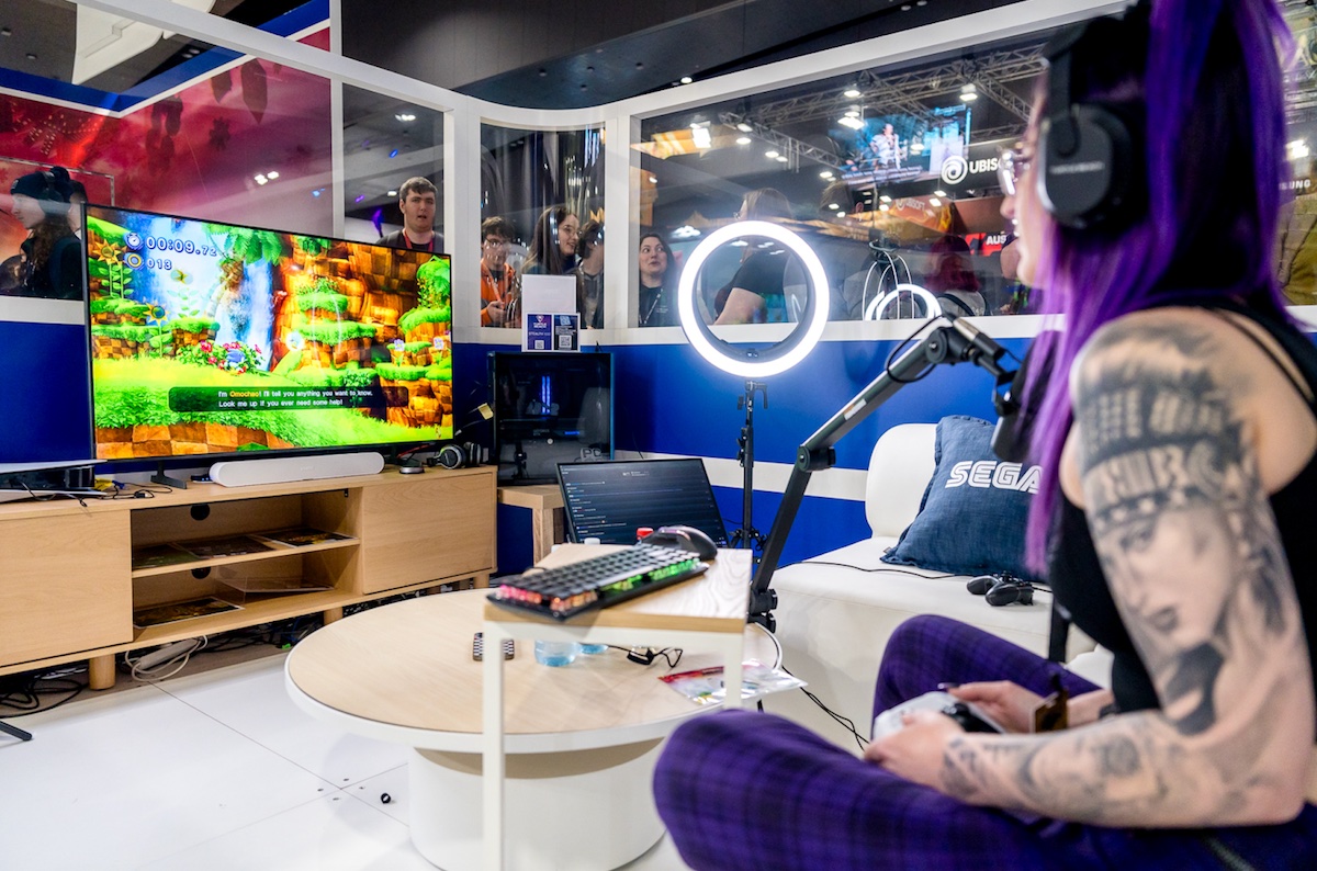 woman gaming at a gaming expo
